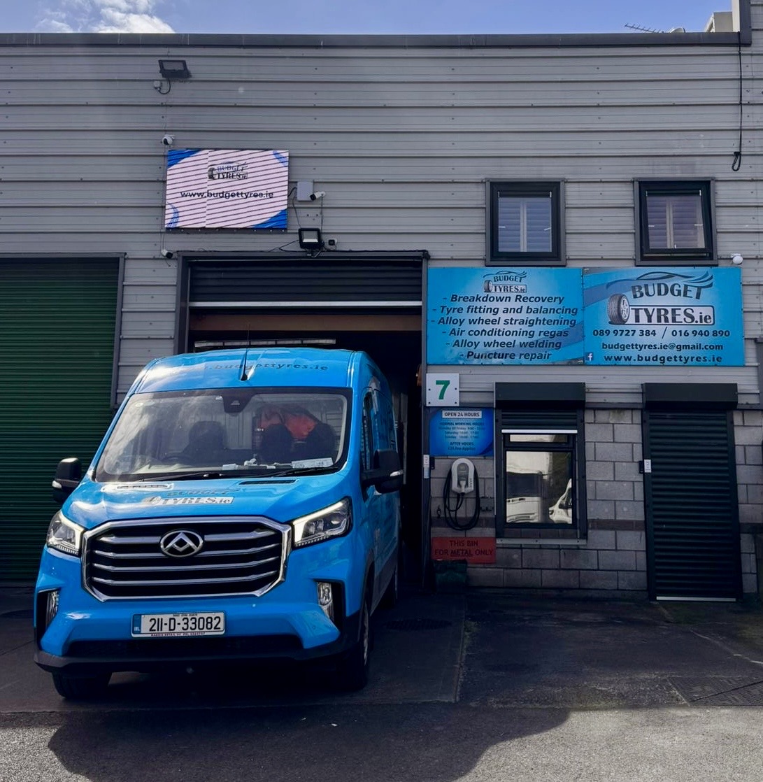 Van outside garage